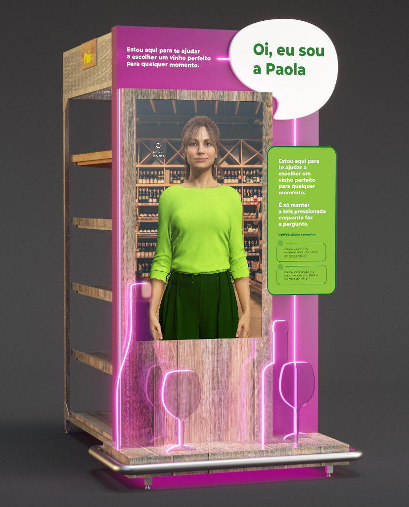 The Paola in-store totem · wood and neon-pink wine-bottle silhouette structure with a vertical screen showing Paola, a magenta header with 'Estou aqui para te ajudar a escolher um vinho perfeito', and a speech bubble reading 'Oi, eu sou a Paola'